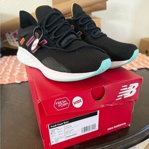 New Balance Women's Black Sneakers with Teal and Pink Accents